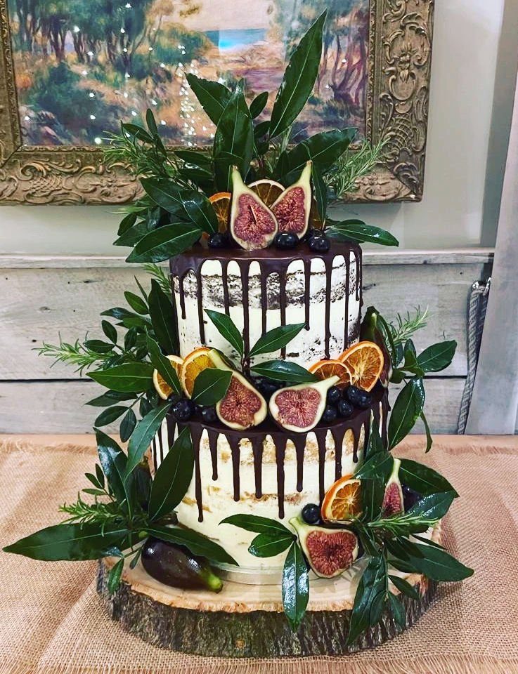 autumn winter semi naked wedding cake with fresh figs